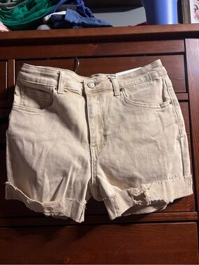 Zenana. High-Rise Beige Distressed Denim Jean Shorts. Soft with slight stretch.